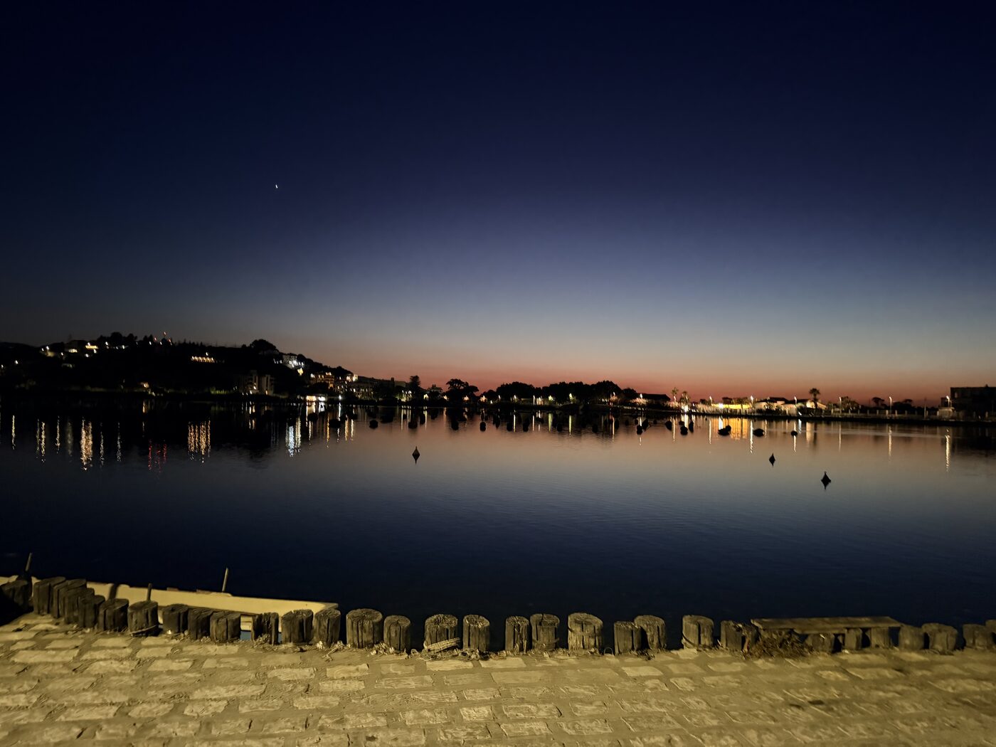 A calm bay at blue hour